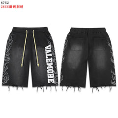 VALEFOREVER Black Washed Denim Shorts with White Graphic Print