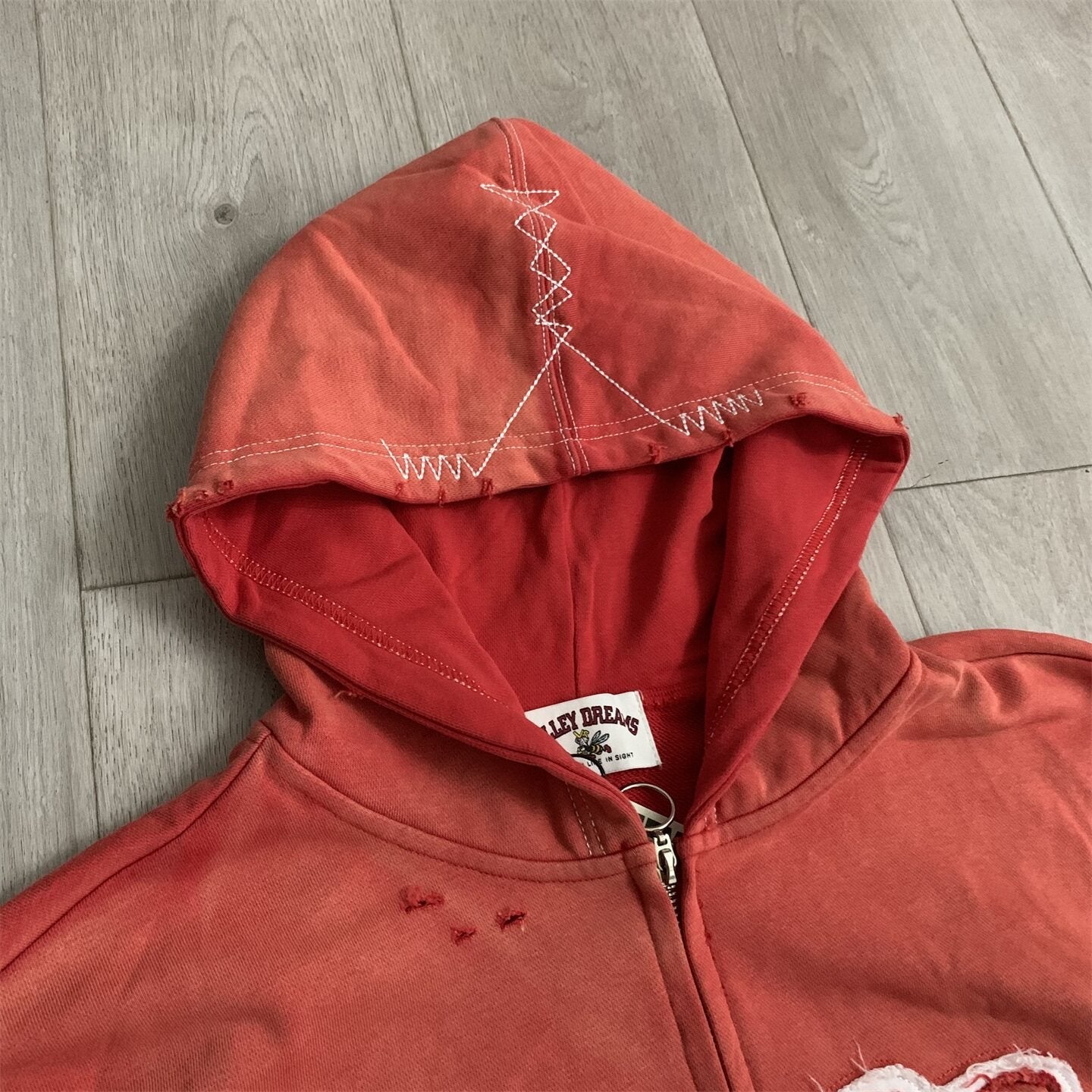 VALLEY Red‑Orange Gradient Graffiti‑Print Valley Dreams Zip‑Up Hoodie Unisex Oversized Jacket