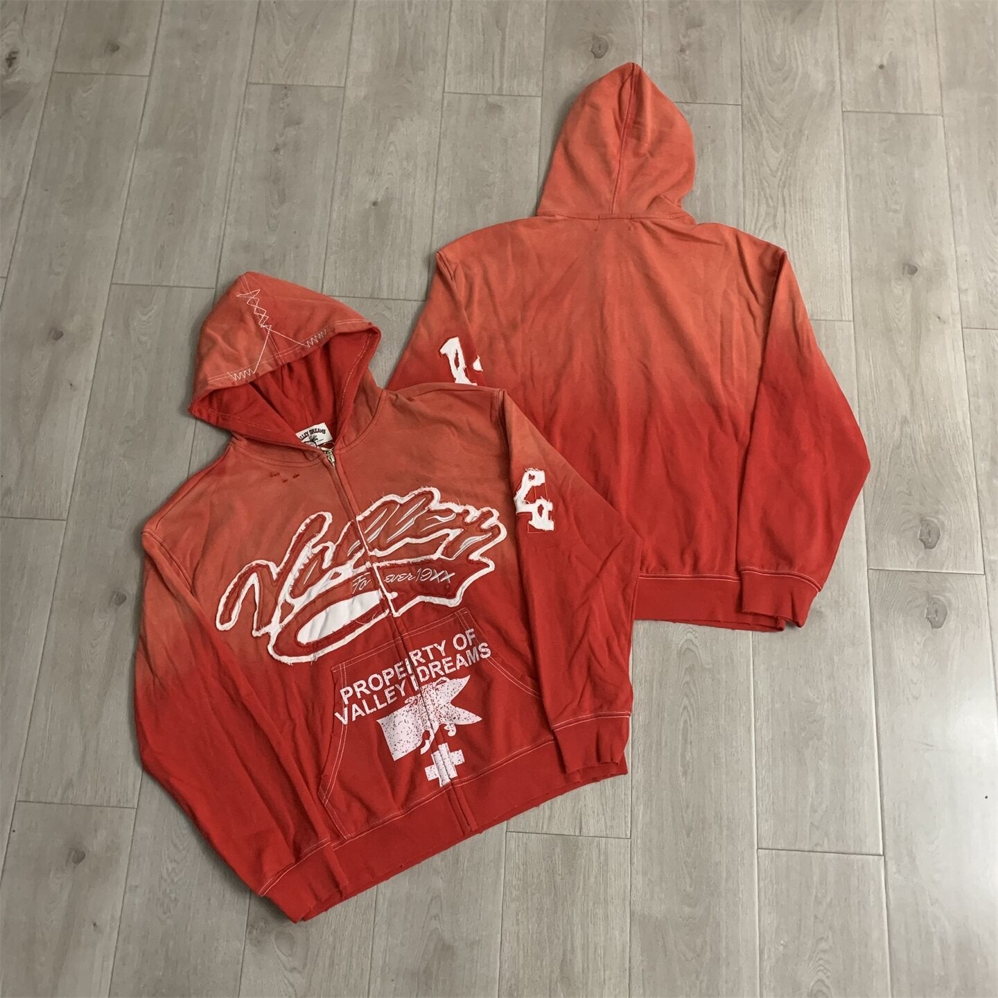 VALLEY Red‑Orange Gradient Graffiti‑Print Valley Dreams Zip‑Up Hoodie Unisex Oversized Jacket